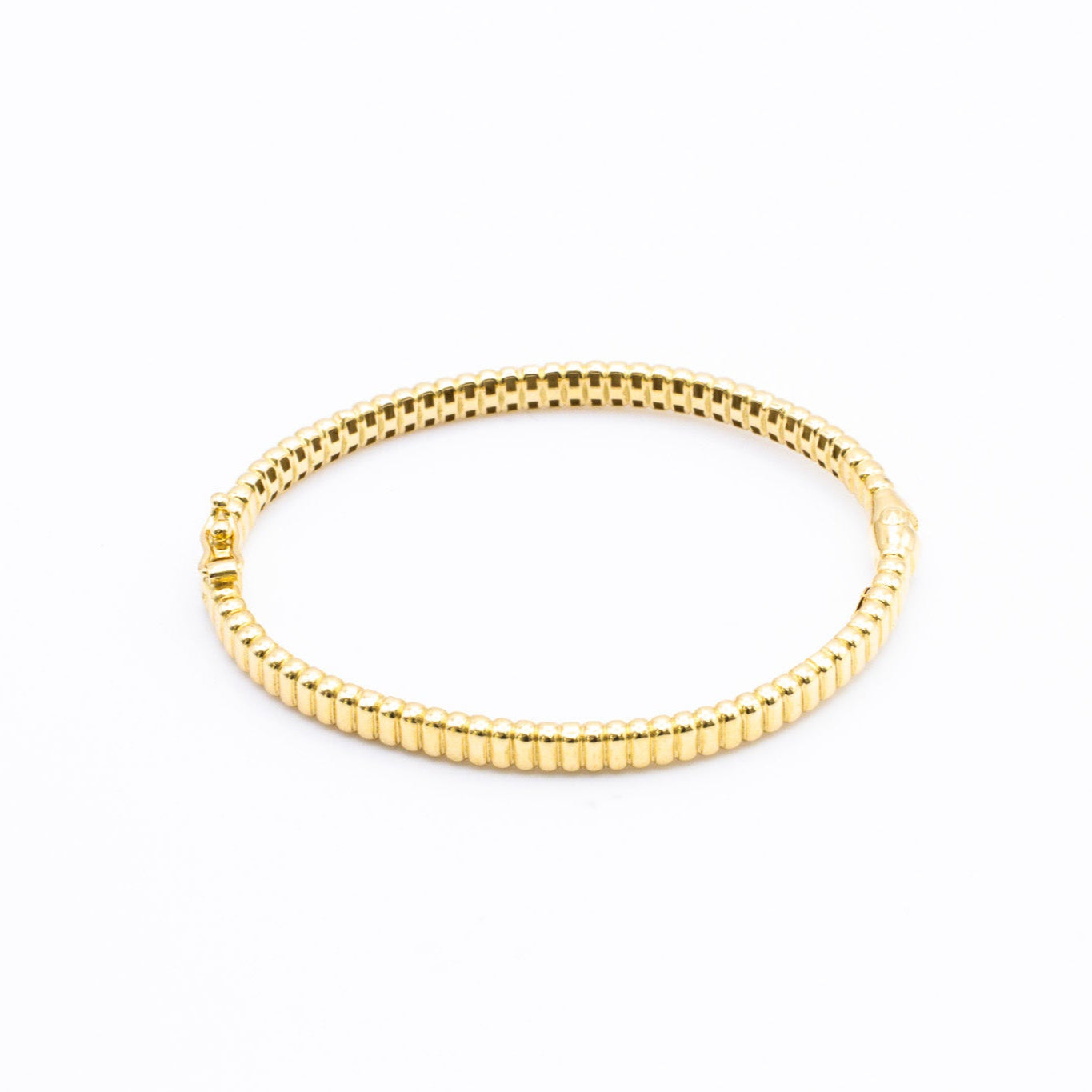Bangle in 18K gold.