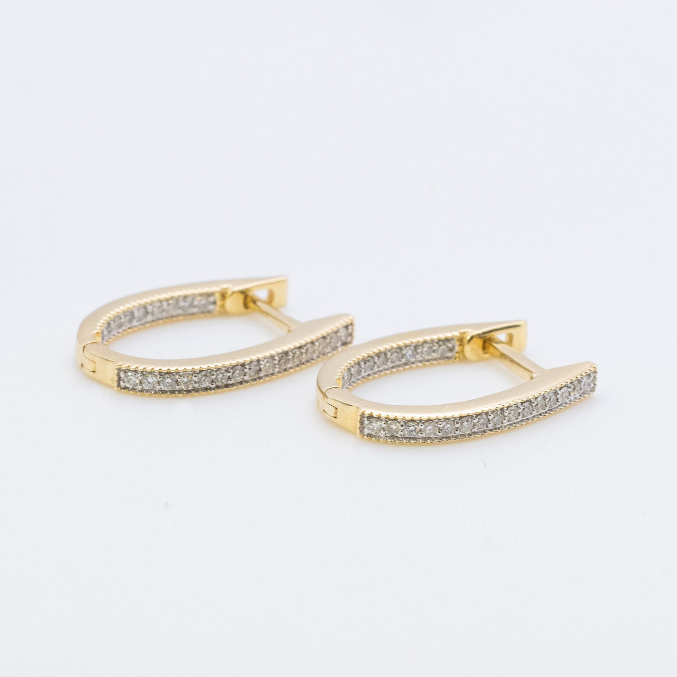 14K Oval Hoop Earrings / Natural Diamonds.
