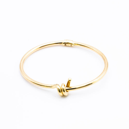 Bangle in 18K Gold.