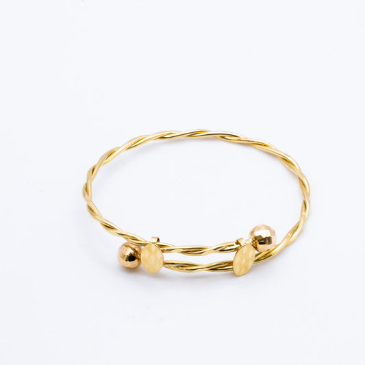 Bangle in 18K Gold.