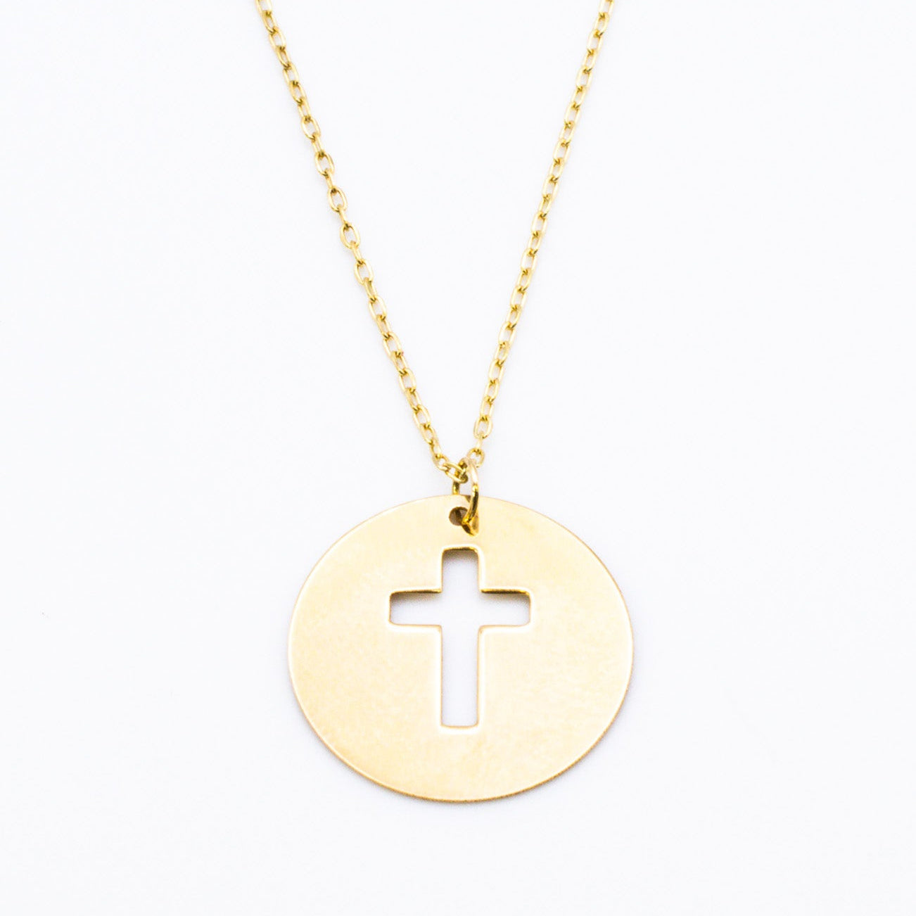 Cross Pendant in 18K Gold.