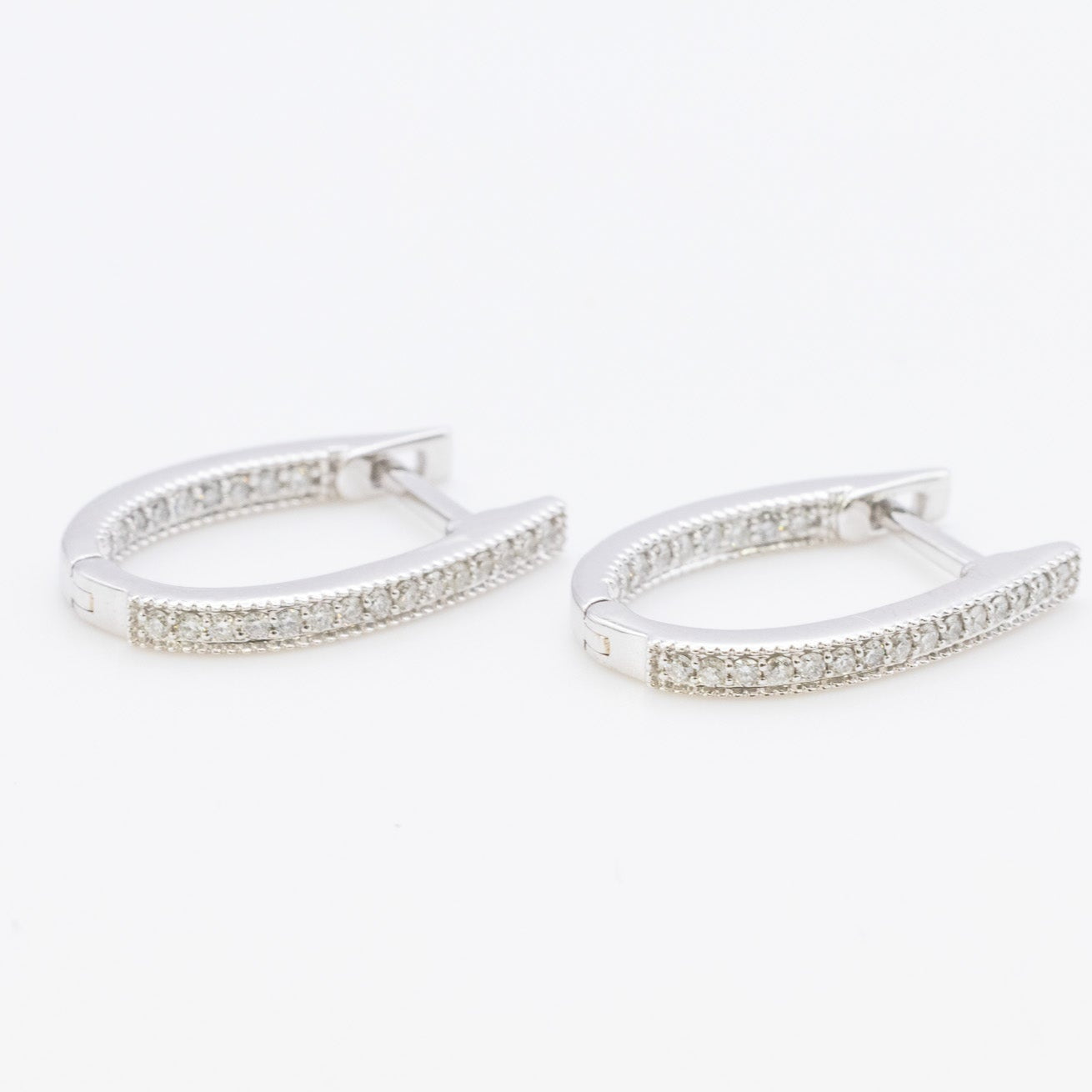 14K Oval Hoop Earrings / Natural Diamonds.